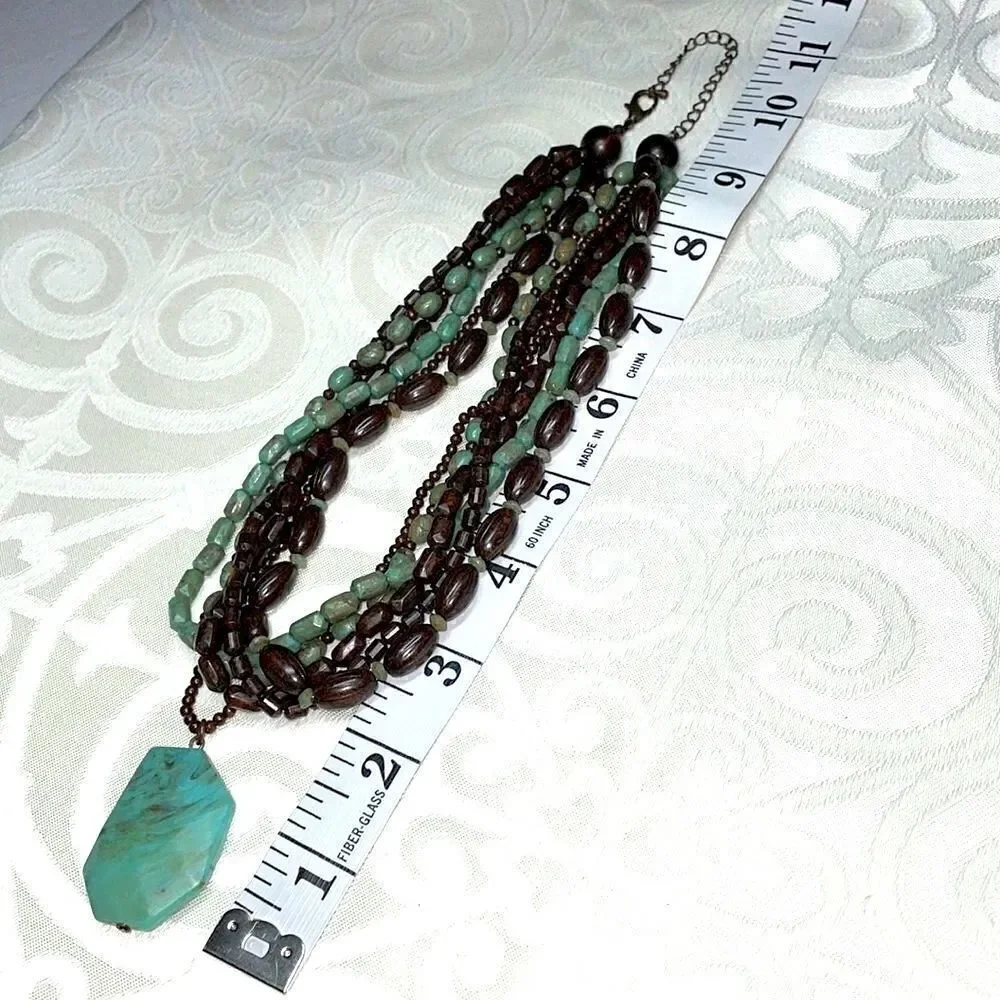 Multi-strand faux turquoise pendant adjustable necklace of browns and blue green
